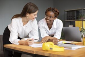 Women working together in a startup company - vocational training